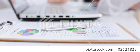 Silver pen lie on colour chart list 82524823