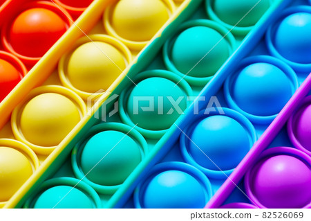 Background of children's toys antistress pop it 82526069