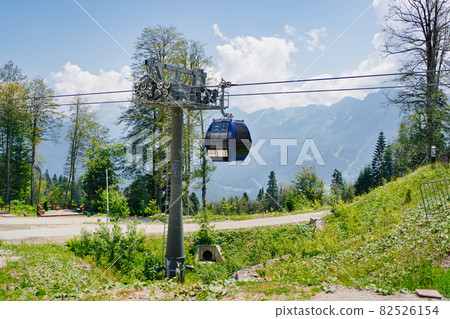 cable car with closed trailers in the mountains. cable car with closed trailers in the mountains. 82526154