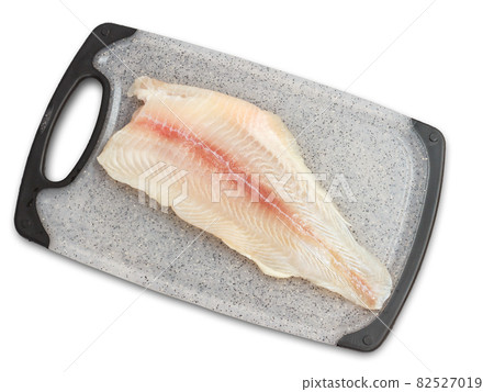 Fillet of raw pangasius fish on cutting board 82527019
