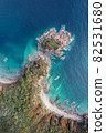 Beautiful view of the Gamov Peninsula and a small rocky island. The Peter the Great Gulf. Bay Telyakovskogo in Russia.  82531680