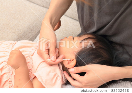 Children having their ears cleaned Children having their ears cleaned 82532458