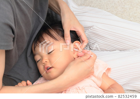Children having their ears cleaned Children having their ears cleaned 82532459