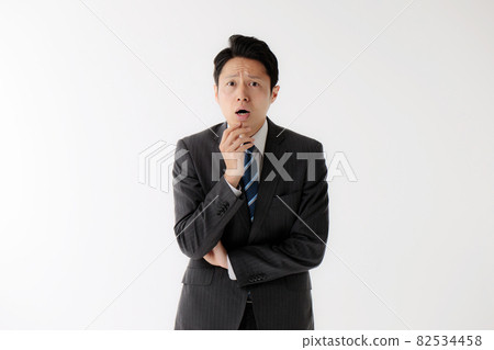 Businessman gesture surprised 82534458
