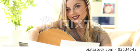 Acoustic Guitar Playing Hobby Workshop at Home 82534542