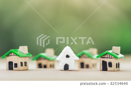 white house in among Green houses for real estate. planning savings money of coins to buy a home white house in among Green houses for real estate. planning savings money of coins to buy a home 82534640