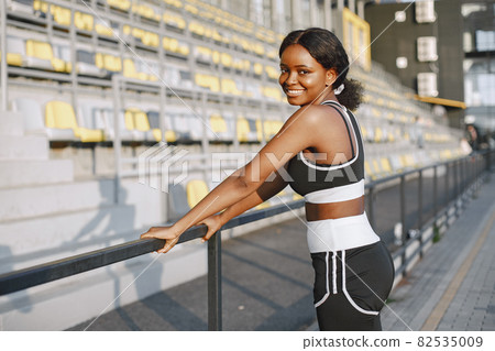 Portrait of a young fit african-american woman training outdoors 82535009