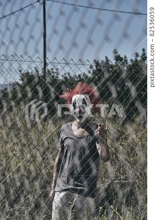 scary evil clown staring at the observer 82536059