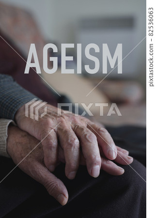 word ageism and old man and woman holding hands 82536063