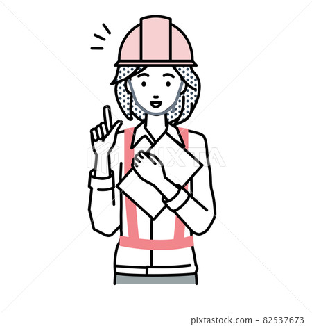 一個建築工地的女人站起來，手裡拿著一份文件 82537673