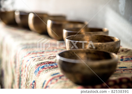 Accessories for sound massage. Tibetan singing bowls treatment 82538391