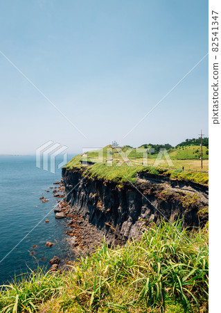 Songaksan Mountain trail with sea in Jeju Island, Korea 82541347