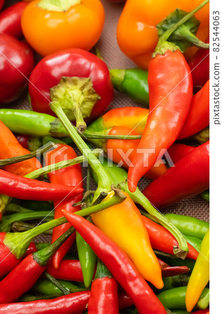 vertical set of fresh hot peppers close-up red and green vertical set of fresh hot peppers close-up red and green 82544063