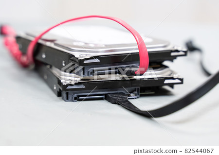 hdd and sata cable close up data storage close up on light background hdd and sata cable close up data storage close up on light background 82544067
