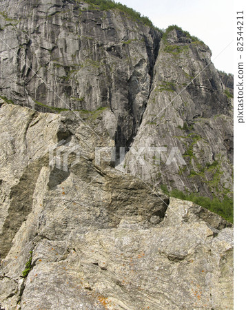 Young and old Colorado mountains overgrown with shallow grass. The concept of development of mountain tourism and extreme mountain sports. Young and old Colorado mountains overgrown with shallow grass. The concept of development of mountain tourism and extreme mountain sports. 82544211
