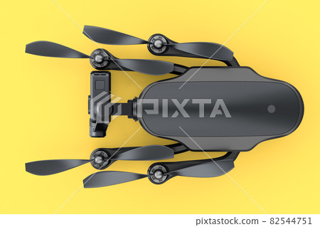 Flying photo and video drone or quad copter with action camera on yellow Flying photo and video drone or quad copter with action camera on yellow 82544751