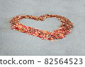 Heart mark made of autumn leaves 82564523