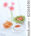 Salad and croissant breakfast 82564590