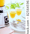Mixer and orange juice 82564596