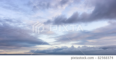 View of colorful cloudscape during dramatic Sunrise. View of colorful cloudscape during dramatic Sunrise. 82568374