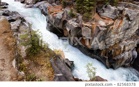 Fresh Water rushing in a canyon. Canadian Nature Background. Fresh Water rushing in a canyon. Canadian Nature Background. 82568378