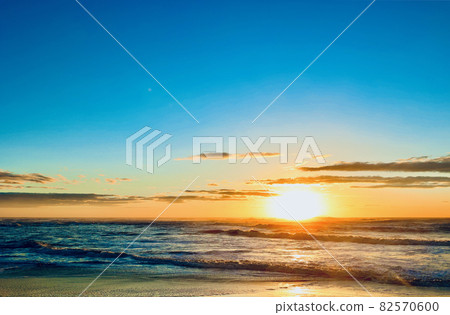 Sunrise over a typhoon, Kawarago Beach, Ibaraki Prefecture 82570600