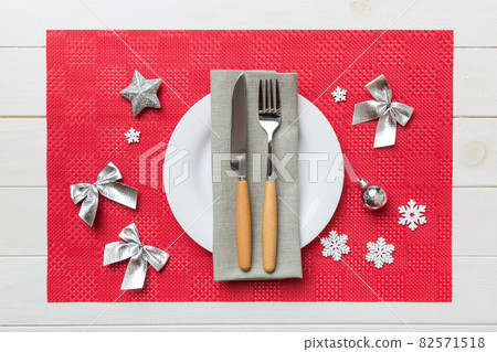 Christmas dinner background with rustic decorations and kitchen utensil . View from above 82571518