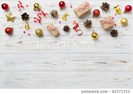 New Year composition. Christmas decor background with pine cones. Top view with copy space 82571553