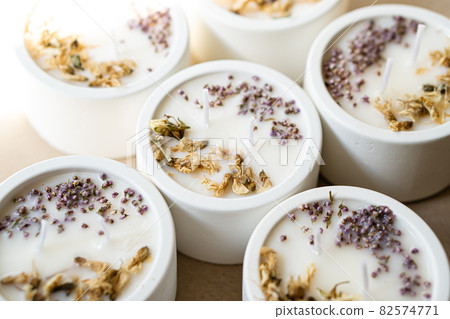 Hand-made concrete candles with dried flowers, scented soy wax vegan candles Hand-made concrete candles with dried flowers, scented soy wax vegan candles 82574771