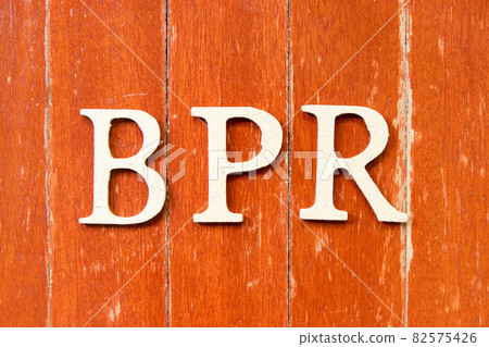 Alphabet letter in word BPR (Abbreviation of Business Process Reengineering or Batch processing record) on old red color wood plate background 82575426