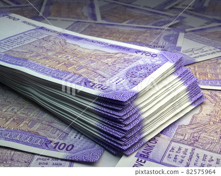 Indian money. Indian rupee banknotes. 100 INR rupees bills. 82575964
