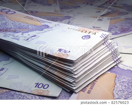 Argentine money. Argentine peso banknotes. 100 ARS pesos bills. Argentine money. Argentine peso banknotes. 100 ARS pesos bills. 82576023