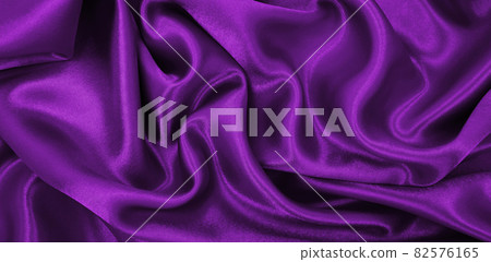 Smooth elegant lilac silk or satin luxury cloth texture as abstract background. Luxurious background design 82576165