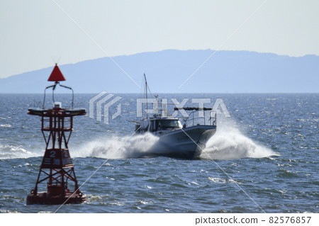 Omuta City Miike Port Fishing boat returning to the port, 82576857