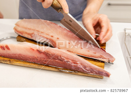 Judging yellowtail in the kitchen of my house Judging yellowtail in the kitchen of my house 82578967