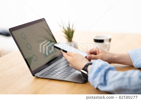 Telework hand typing Telework hand typing 82580277