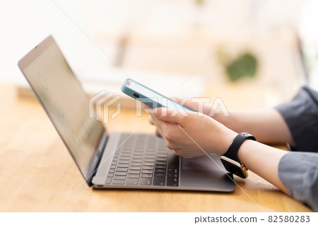 Telework hand typing Telework hand typing 82580283