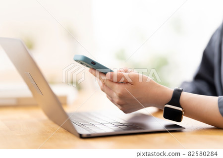 Telework hand typing Telework hand typing 82580284