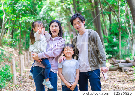 Happy family enjoying a hike 82580820