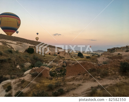 Flying in hot air balloon over Cappadocia gives you the opportunity to see all the beauty of this picturesque region. 82582350