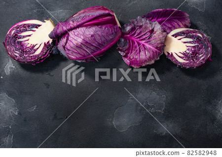 Red cabbage, anthocyanin-rich atop dark background, top view, copy space Red cabbage, anthocyanin-rich atop dark background, top view, copy space 82582948