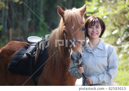 Horse and groom Horse and groom 82583013