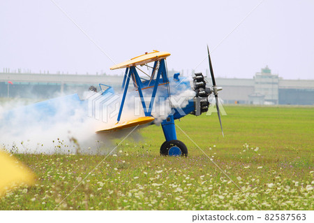 An airplane that breaks down and blows smoke An airplane that breaks down and blows smoke 82587563