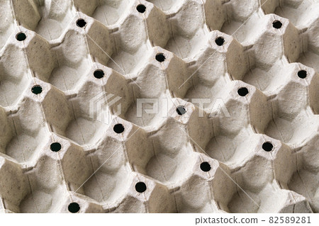 Empty cardboard egg tray texture. Empty cardboard egg tray texture. 82589281