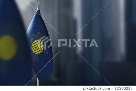 Small flags of Commonwealth on a blurry background of the city Small flags of Commonwealth on a blurry background of the city 82590223