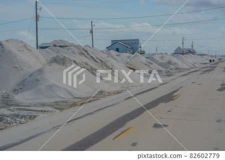 Hurricane Ida washed White sand up from the beach over this neighborhood. It happened on Dauphin Island in Mobile County, Alabama Hurricane Ida washed White sand up from the beach over this neighborhood. It happened on Dauphin Island in Mobile County, Alabama 82602779
