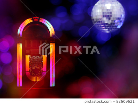 Jukebox in Bar with Disco Ball and Bokeh Jukebox in Bar with Disco Ball and Bokeh 82609621