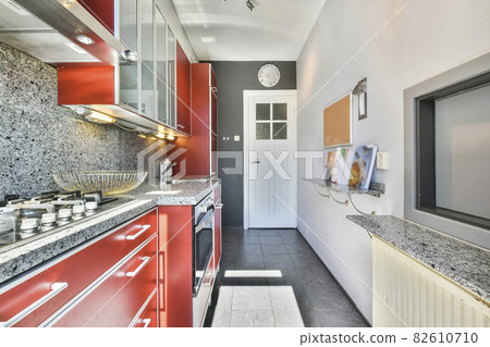 Interior of a beautiful kitchen in modern apartment 82610710