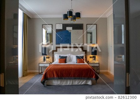 Orange and black stylish bedroom 82612300