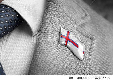 Metal badge with the flag of Faroe Islands on a suit lapel Metal badge with the flag of Faroe Islands on a suit lapel 82616680